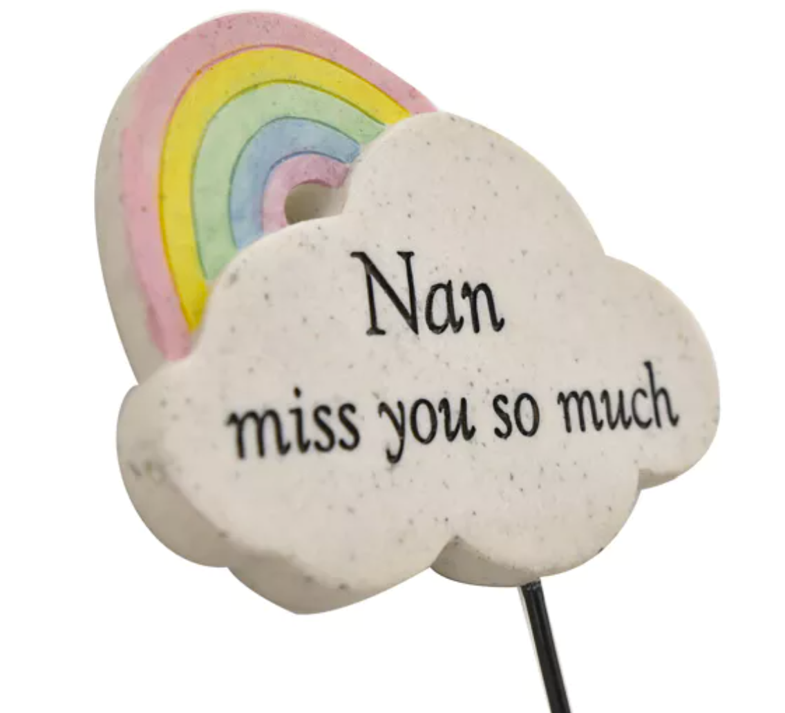 Close up of the Nan rainbow cloud memorial plaque reading Nan miss you so much