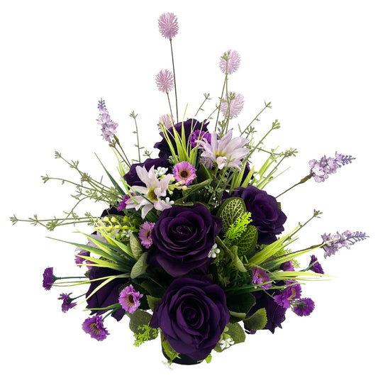 Purple artificial graveside flower arrangement in a pot front view