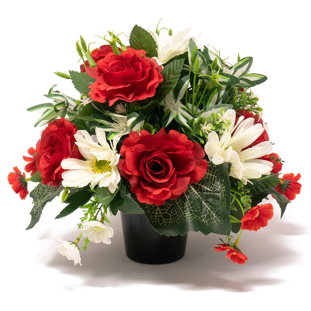 Elyas artificial memorial flower arrangement of red roses and white gerberas with greenery in a black pot