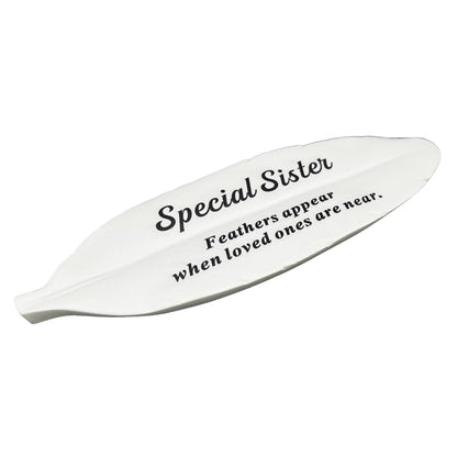 Special Sister white feather memorial plaque close up