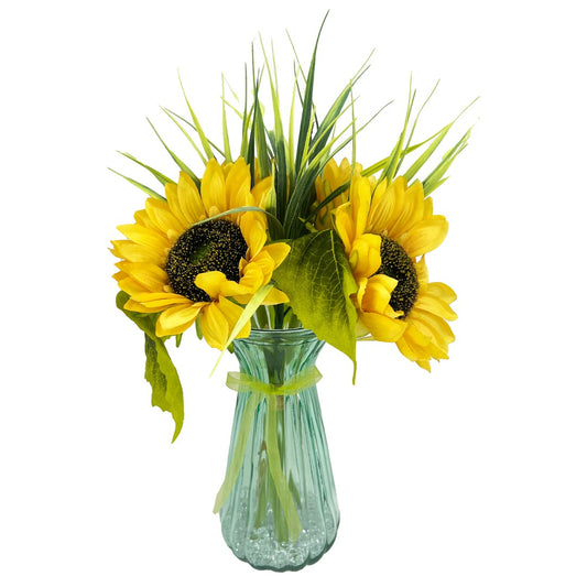 Helia artificial sunflowers in ribbed green glass vase with clear stones and green ribbon