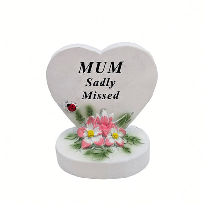 Mum Sadly Missed white heart memorial with pink flowers front view