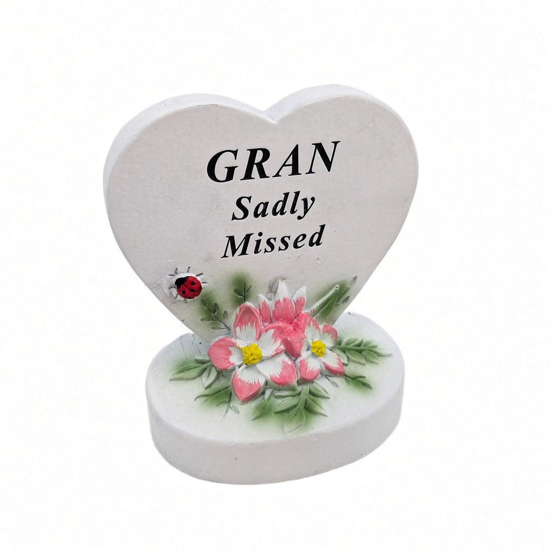 Gran Sadly Missed white heart memorial with pink flowers