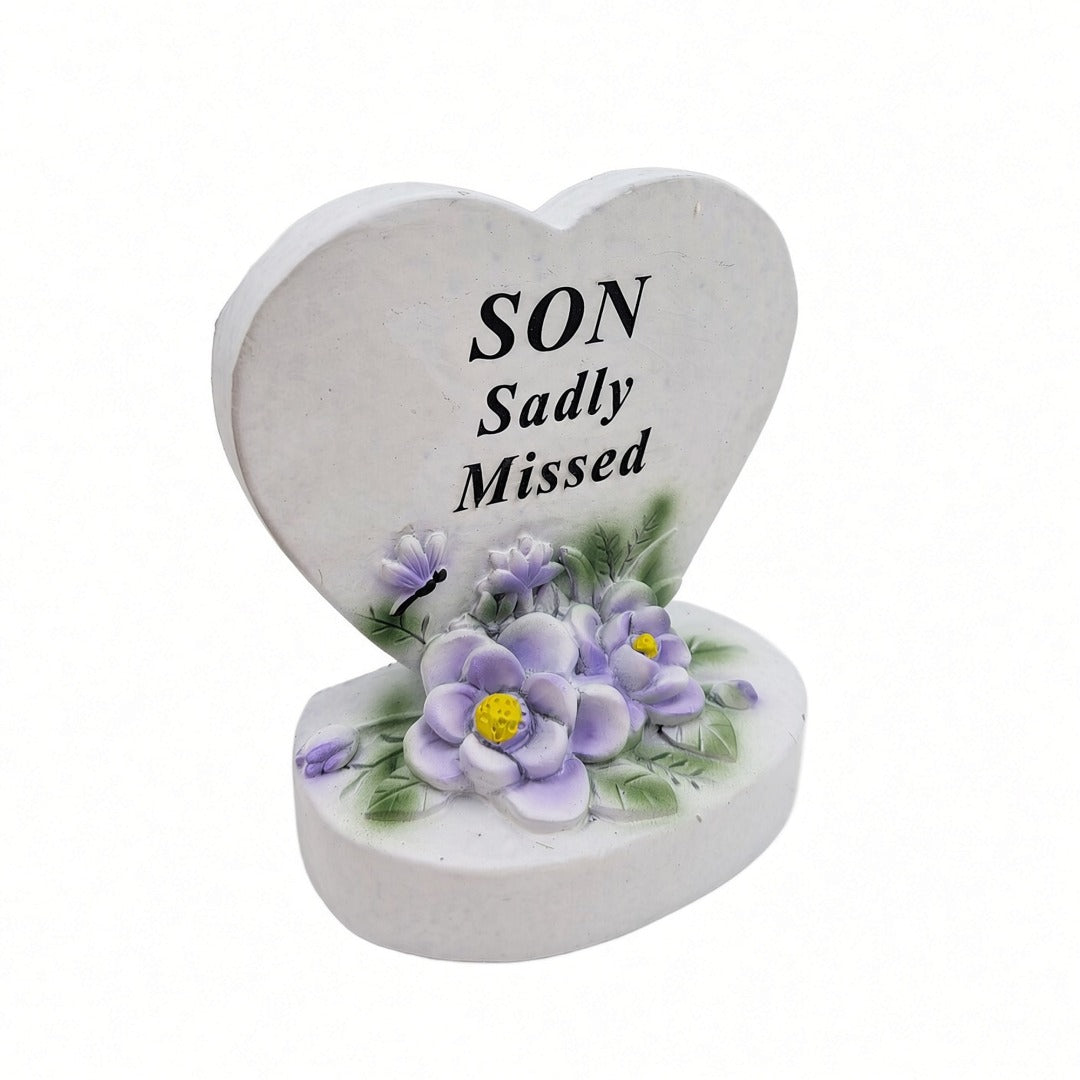 Son Sadly Missed white heart memorial with purple flowers