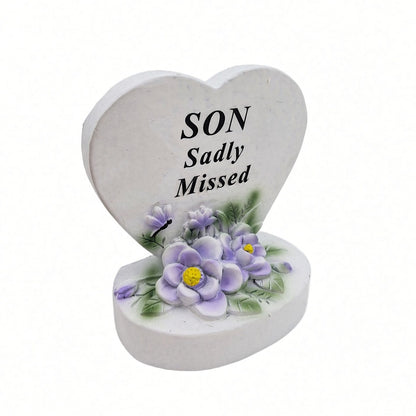 Son Sadly Missed white heart memorial with purple flowers