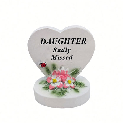 Daughter Sadly Missed white heart memorial with pink flowers front view