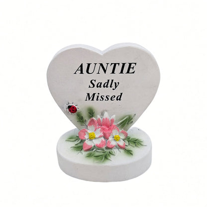 Auntie Sadly Missed white heart memorial with pink flowers front view